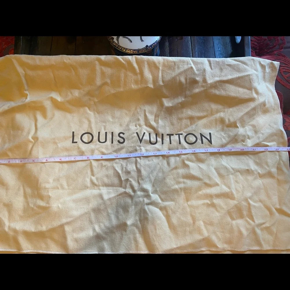 Authentic Louis Vuitton dust cover.